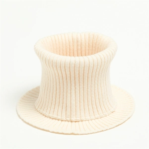 Detailed view of the thick ribbed knit texture on a creamy white winter neck warmer scarf