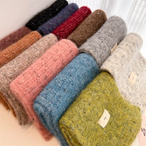 Chunky wool blend knit scarf with colorful flecks and minimalist ins label