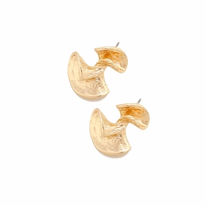 Detailed view of gold twisted geometric stud earrings with textured hammer finish