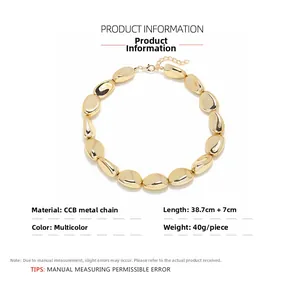Detail view of large gold CCB beads necklace showing 38.7cm length and 7cm extender