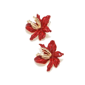 Chic 3D red enamel flower earrings with golden core for women on a white background