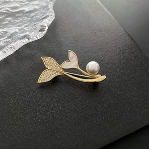 Exquisite mermaid tail brooch with pearls, zircons and iridescent shell in gold finish