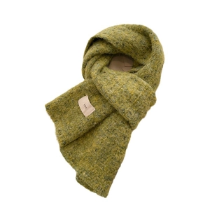 Grass green wool knit scarf with soft texture and pink ins label for winter warmth
