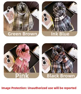 Detail view of plaid cashmere-like scarves with fringe in four stylish color combinations