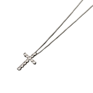 Sparkling silver cross pendant necklace with hollow heart design and clear gemstones