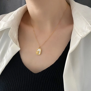 Elegant gold titanium steel necklace with white shell moon rabbit pendant for women