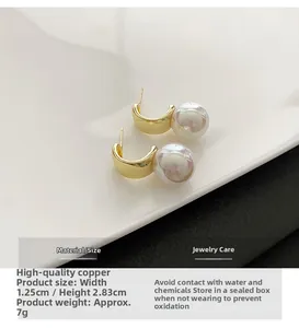 Detailed size and weight specs for the gold arc earrings with white pearls