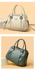 Dettaglio di borse in pelle PU martellata bianca e verde con logo metallico fine