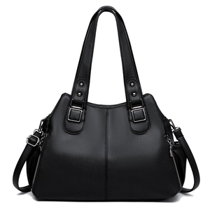 Classic black leather tote bag with pebble texture and silver hardware on white background