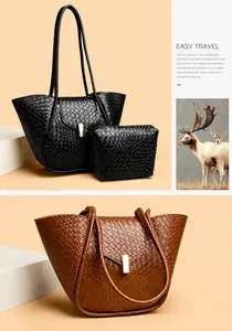 Vista dettagliata della borsa tote intrecciata con fibbia dorata e pochette abbinata