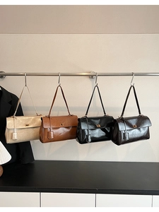 Row of retro oil wax leather shoulder bags in cream, brown, black, and coffee colors