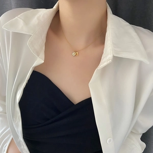 Elegant gold titanium steel necklace with B letter pendant and round tag on bead chain