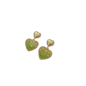 Elegant heart-shaped double layer earrings with gold trim and green crystals on white back