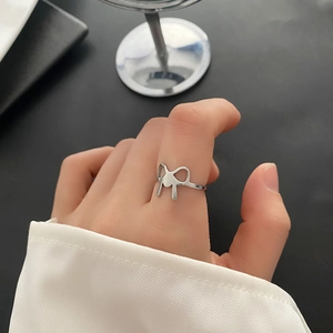 Polished titanium steel bow ring with adjustable open band for women's jewelry