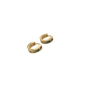 Gold huggie hoop earrings with rainbow square cubic zirconia stones on white background