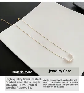 Detail of beaded pearl necklace with titanium steel chain, length 40.06cm plus 5cm extender
