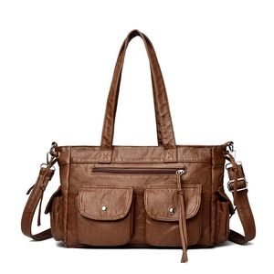 Sac fourre-tout rétro marron foncé à plusieurs poches avec texture vintage et doubles anses
