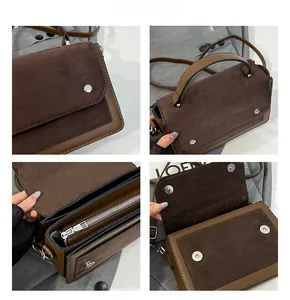Detail view of contrast patchwork leather handbag with magnetic closure and inner pocket