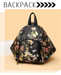 Detail view of floral and butterfly print backpack with diamond-patterned design features