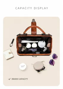 Top view of vintage brown doctor bag interior showing large capacity and zipper compartments