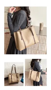 Detailed views of a beige large capacity tote bag with adjustable brown shoulder straps