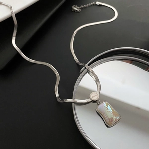 Silver blade chain necklace with rectangular iridescent shell pendant and Love engraving