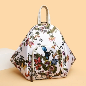 Women's multi-functional backpack with butterfly floral print and 3D geometric structure