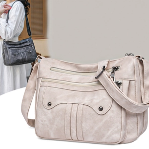 Vintage multi-pocket shoulder bag for women in off-white and charcoal gray faux leather