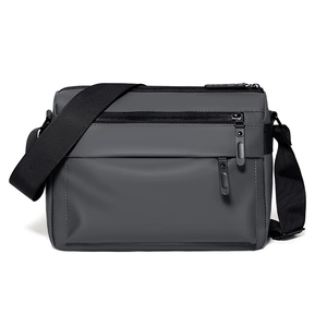 Charcoal grey waterproof messenger bag with multi-zipper pockets for outdoor and commute