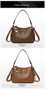 Detail of the litchi texture faux leather surface and metal zippers on a crossbody bag