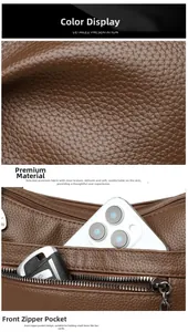 Detailed view of brown litchi grain leather texture and front zipper pocket design