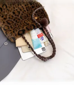 Overhead shot showing the large capacity of this leopard faux fur tote bag with essentials