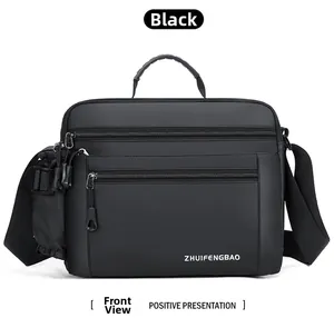Front detail of black waterproof shoulder bag with dual zipper pockets and side bottle holder