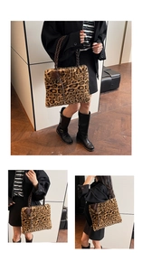 Detail of leopard print faux fur tote bag with braided leather handle and pompom charm