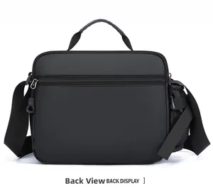 Back view of black waterproof nylon messenger bag with top handle and side bottle pocket