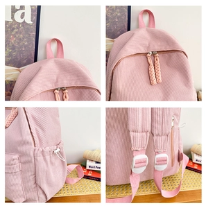 Detailed views of pink corduroy backpack with woven zippers and side drawstring pockets