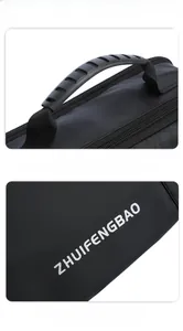 Detail of the durable nylon handle and double zipper on this black men's shoulder bag