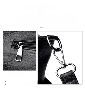 Detailed macro view of silver metallic buckles and textured black pebble leather on tote bag