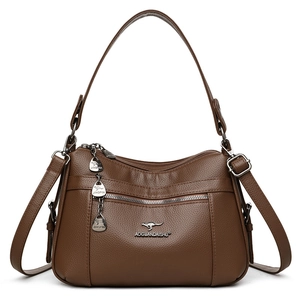 Brown textured leather multi-compartment crossbody bag for women with kangaroo charms