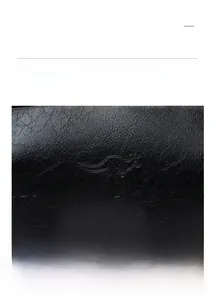 Close-up of black litchi leather texture with water-resistant and durable features