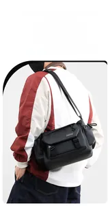 Detail showing the high-strength wear-resistant fabric and multi-pocket design on the bag