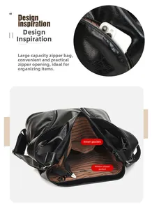 Detail of vintage black pebble leather bag showing interior pockets and striped lining