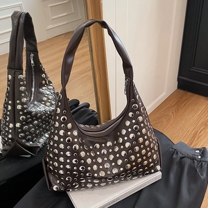 Fashionable dark brown leather underarm bucket bag with decorative silver rivets