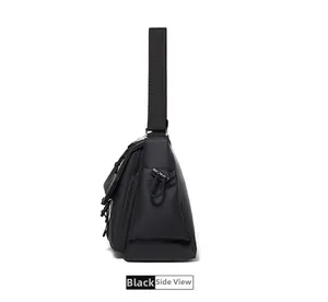 Close-up of black tactical messenger bag side with adjustable drawstring pocket and strap