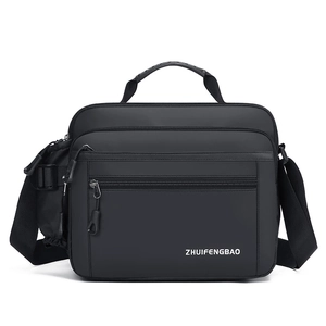 Waterproof black rectangular shoulder bag with multiple zippered pockets and top handle