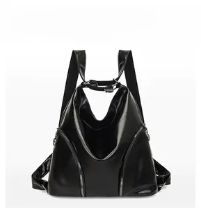 Front view of black retro multi-purpose backpack with dual diagonal zipper details