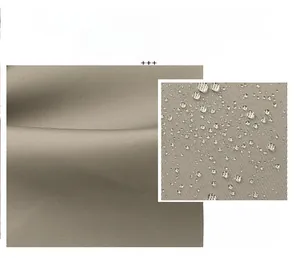 Close-up of waterproof brown nylon fabric with water droplets on the smooth texture