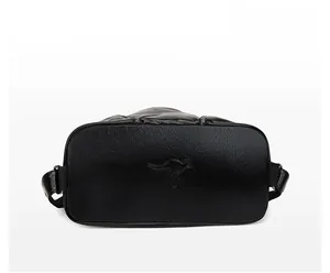 Close-up of black PU leather bag bottom with embossed kangaroo logo and pebble texture