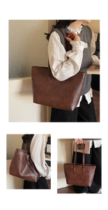 Detail of vintage brown leather tote bag with FASHION BAGS embossed text decoration