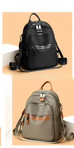 Macro detail of the high-quality nylon backpack featuring multi-pocket zippers and side pockets